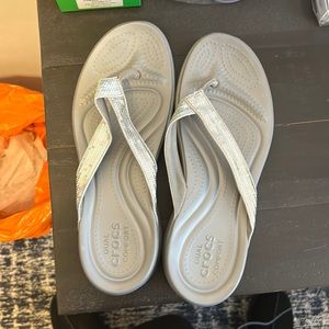 Silver crocs flip flops
